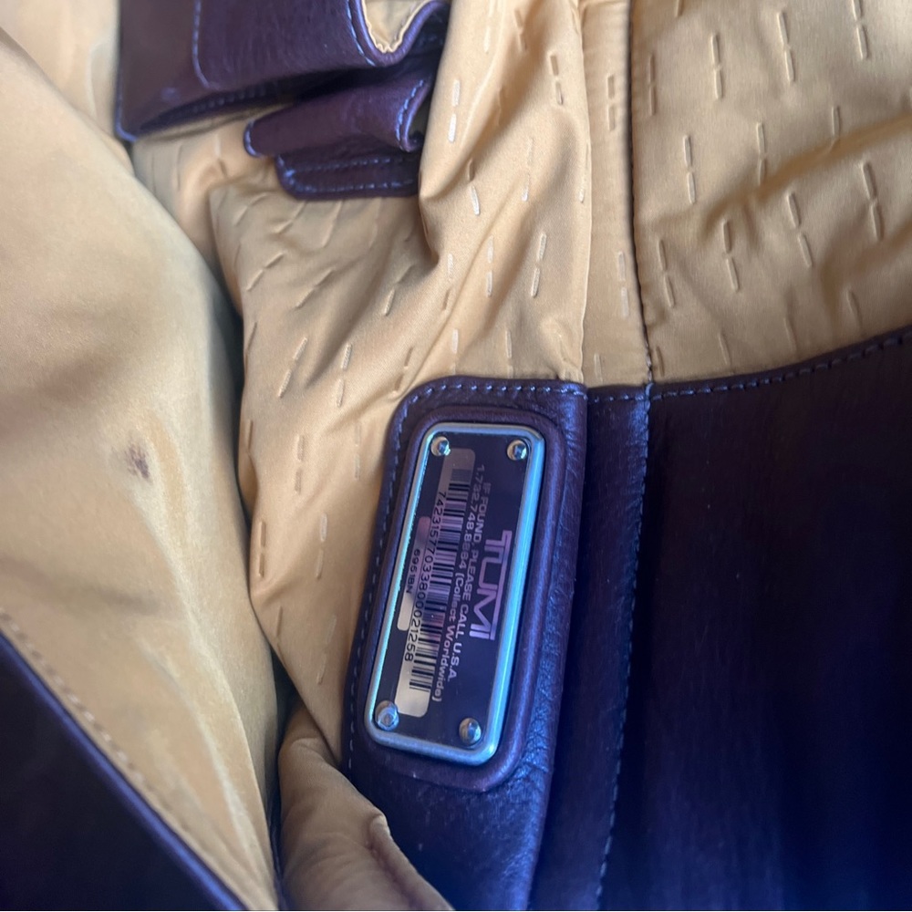 Tumi Duffel leather brown bag- pre-owned -great condition.